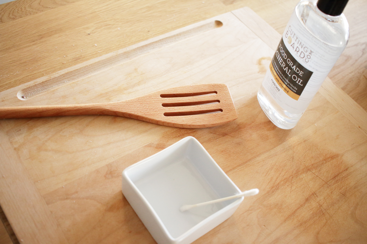 mineral oil and wood spatula