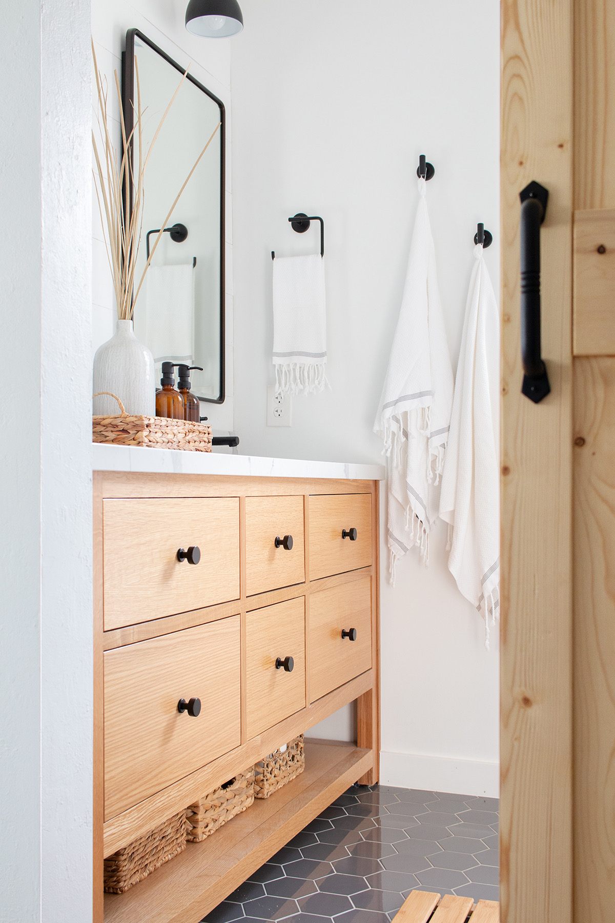 White and oak tiny master bathroom